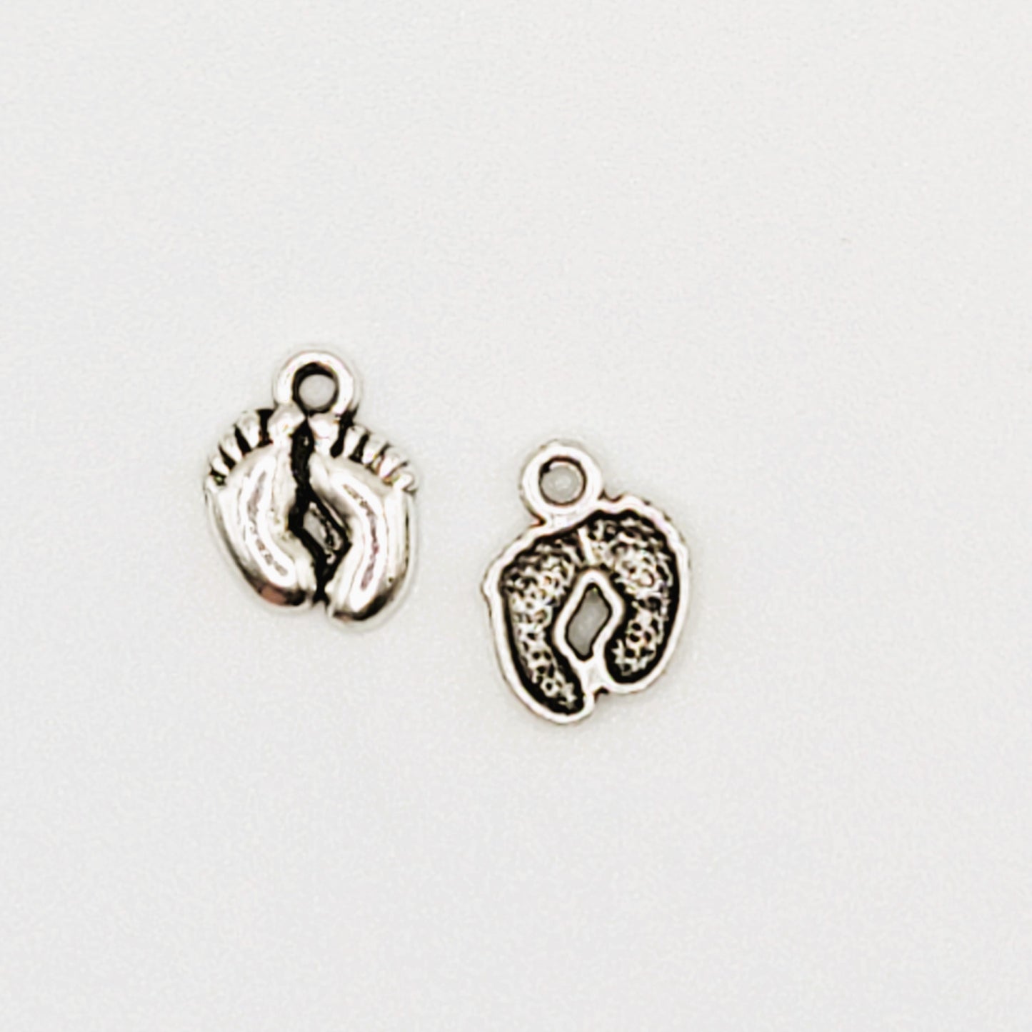 12 Pcs Baby Feet Charm Antique silver tone. SKU# CR067