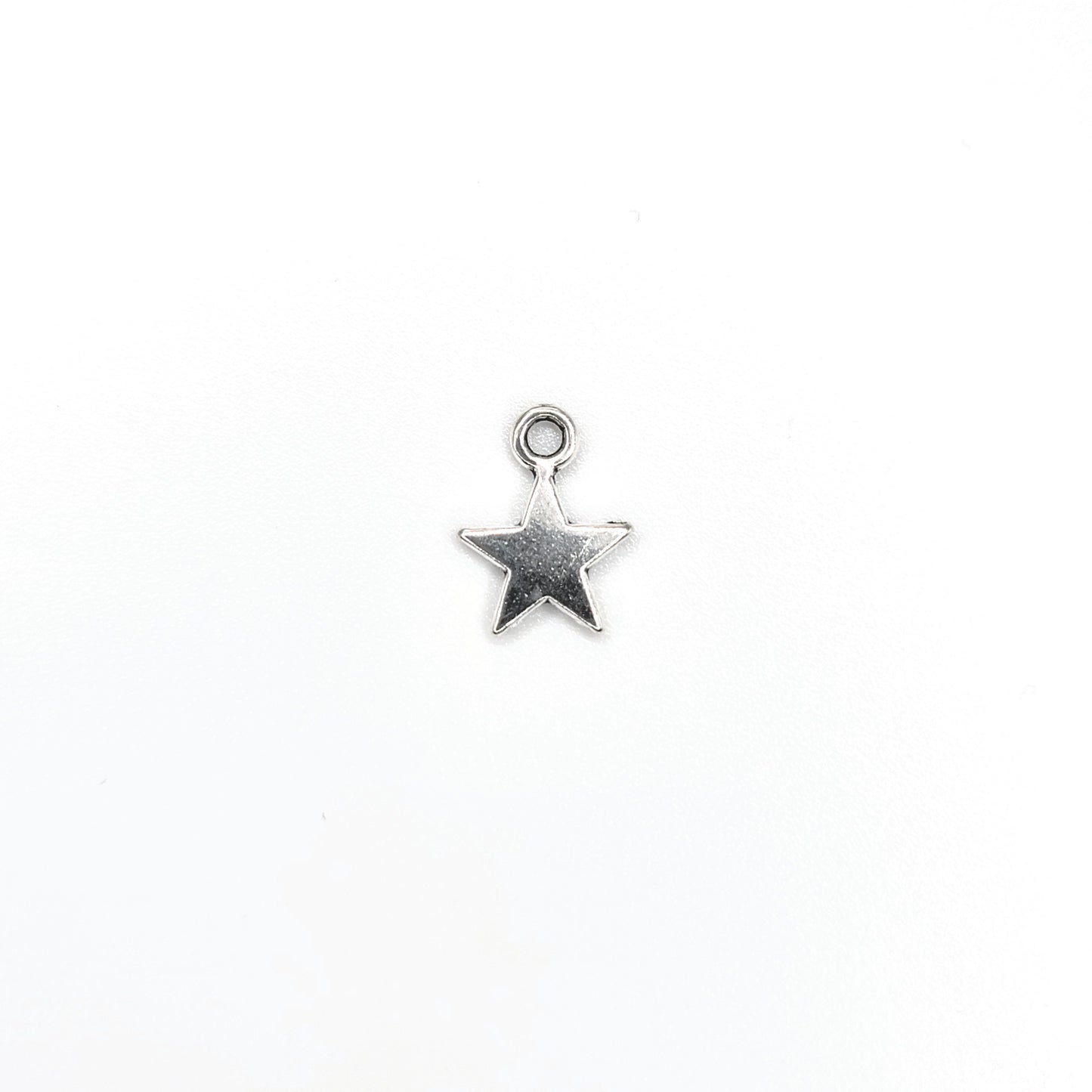 Silver Tone Star Charm